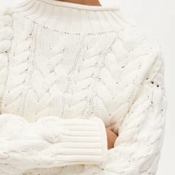 2025 Rollneck™ cable-knit sweater