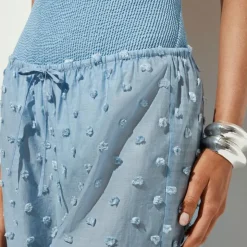 Beach pant with pom-poms