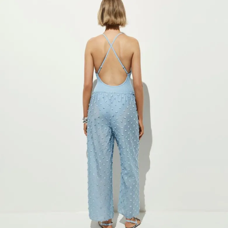 Beach pant with pom-poms
