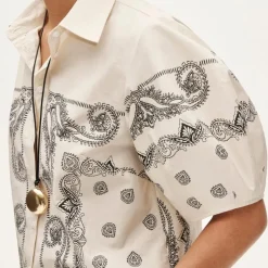 Bell-sleeve button-up shirt in bandana print