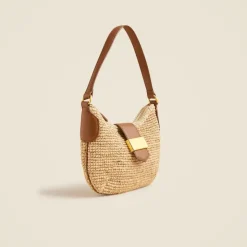 Berkeley buckle shoulder bag in handknotted straw