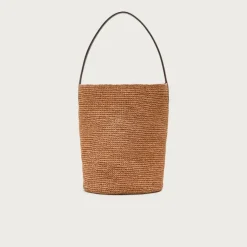 Berkeley handknotted bucket bag in raffia
