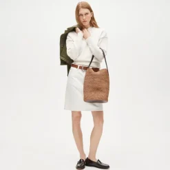 Berkeley handknotted bucket bag in raffia