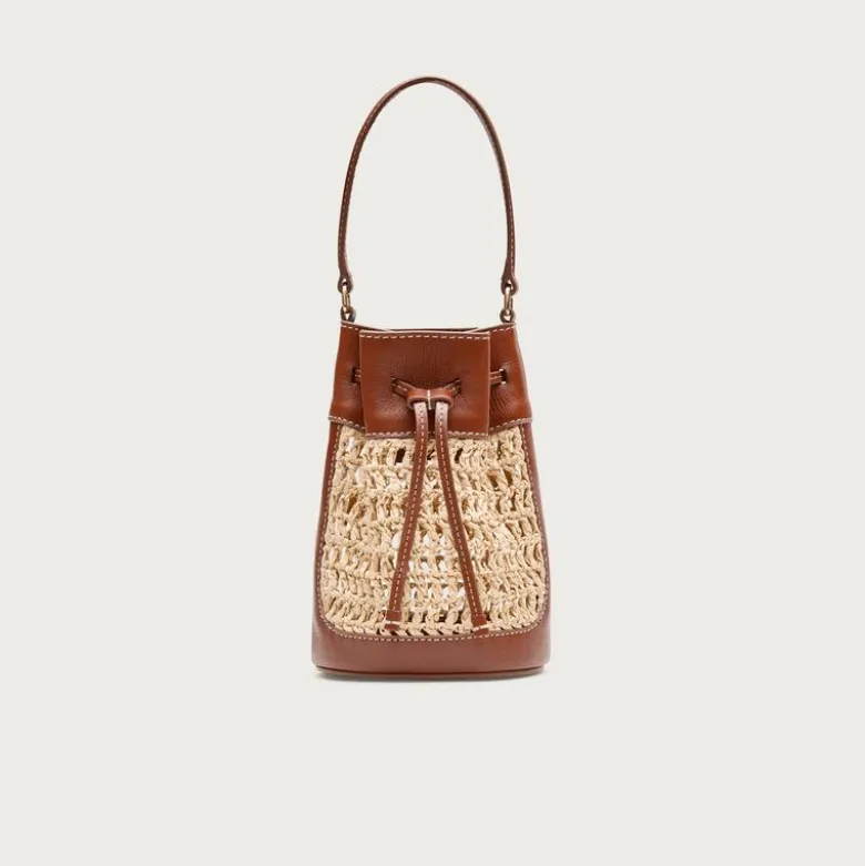 Drawstring bag in straw and leather