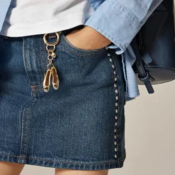 Girls' denim skirt with studs