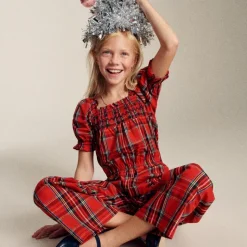 Girls' smocked jumpsuit in Good Tidings plaid