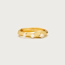 Grommet cuff bracelet