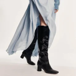 Knee-high round-heel boots in patent leather