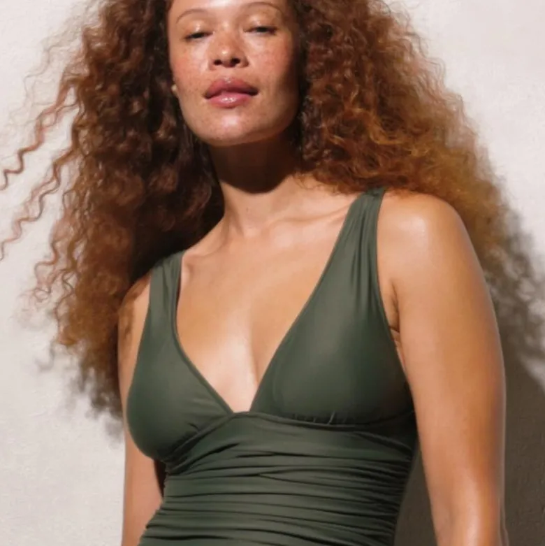 Long-torso ruched V-neck one-piece