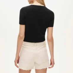 Mid-rise A-line denim short in ecru