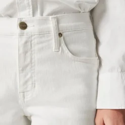 Mid-rise kickout jean