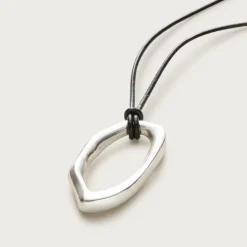 Oval pendant necklace with leather cord