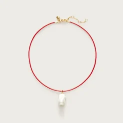 Pearl pendant and leather cord necklace