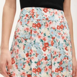 Pleated knee-length skirt in floral print
