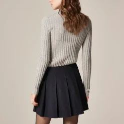 Pleated mini skirt with buckle detail