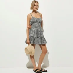 Smocked mini dress in gingham