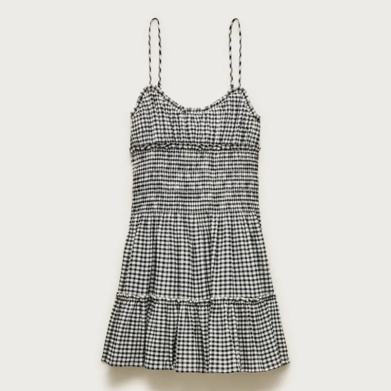 Smocked mini dress in gingham