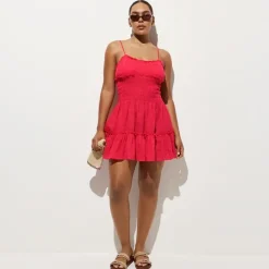 Smocked mini dress in Hampton linen-blend