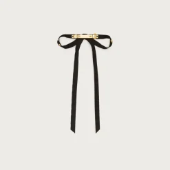 Studded leather hair bow